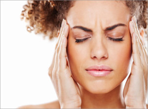woman suffering from severe headache