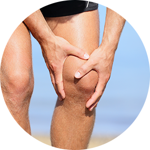 man holding his sprained knee